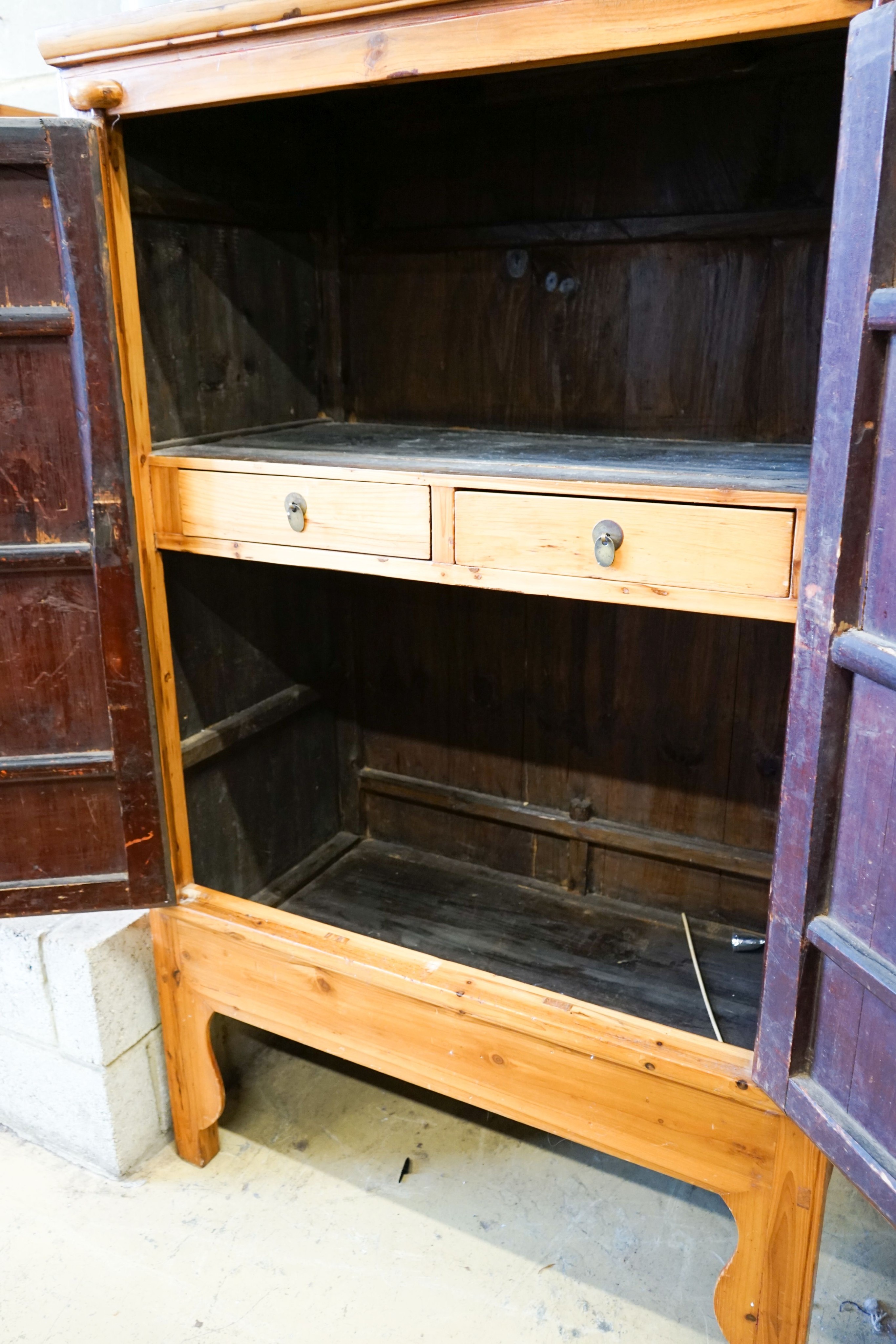 A Chinese pine cabinet, width 104cm, depth 61cm, height 173cm